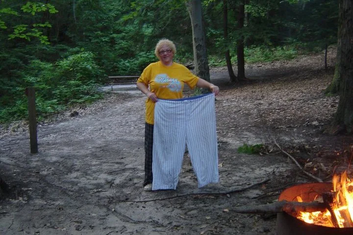 Linda holding her old pants